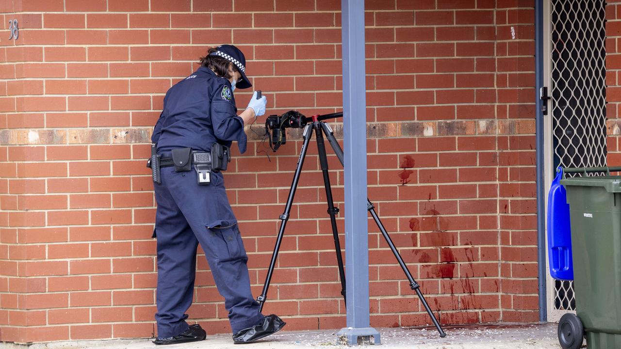 Major Crime officers at the alleged murder scene. Picture: Brett Hartwig