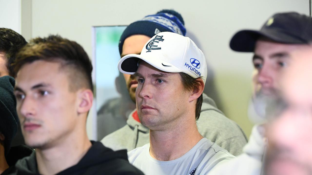 New Carlton caretaker coach David Teague watches on during Brendon Bolton’s press conference on Monday.