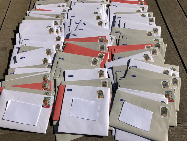 Cheryl Critchley’s Christmas card mail-out pile for 2019. Picture: supplied