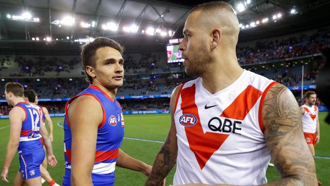 ‘Buddy clone’ Jamarra Ugle-Hagan has a moment with the Swans’ superstar after the match. Picture: AFL Photos/Getty Images