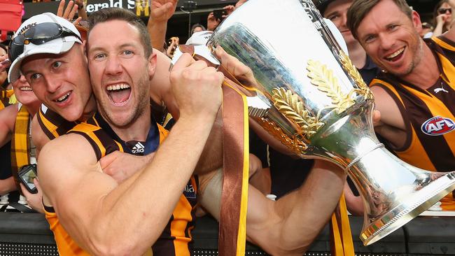 James Frawley wins his first premiership in his first year with Hawthorn.