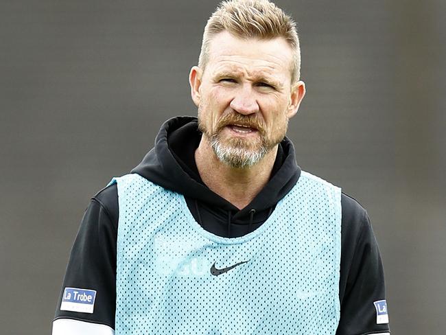 MELBOURNE, AUSTRALIA - APRIL 13: Nathan Buckley, Senior Coach of the Magpies looks on during a Collingwood Magpies AFL training session at the Holden Centre on April 13, 2021 in Melbourne, Australia. (Photo by Darrian Traynor/Getty Images)