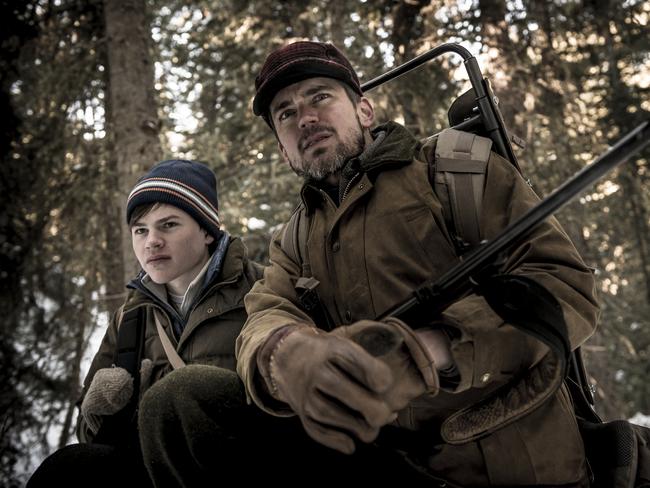 A hunting trip goes horribly wrong for David (Josh Wiggins) and his dad Cal (Bomer) in Walking Out. Picture: Icon Films