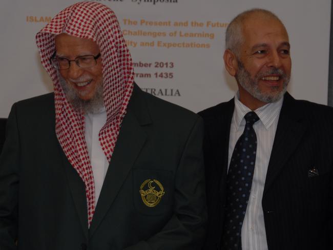 World Muslim League General Secretary Abdallah Ben Abdel Mohsen Al-Turki wearing the school blazer of Sydney's Malek Fahd Islamic School. With AFIC president Hafez Kassem.