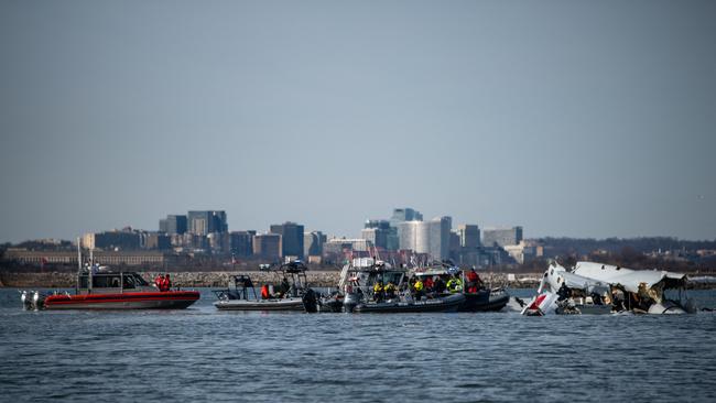 Emergency services search the wreckage of American Airlines flight 5342 in the Potomac River. Picture: AFP