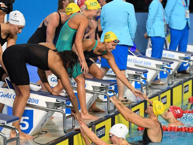 Australia's Bronte Campbell is congratulated by team mates Emily Seebohm, Georgia Bohl and Emma Mckeon