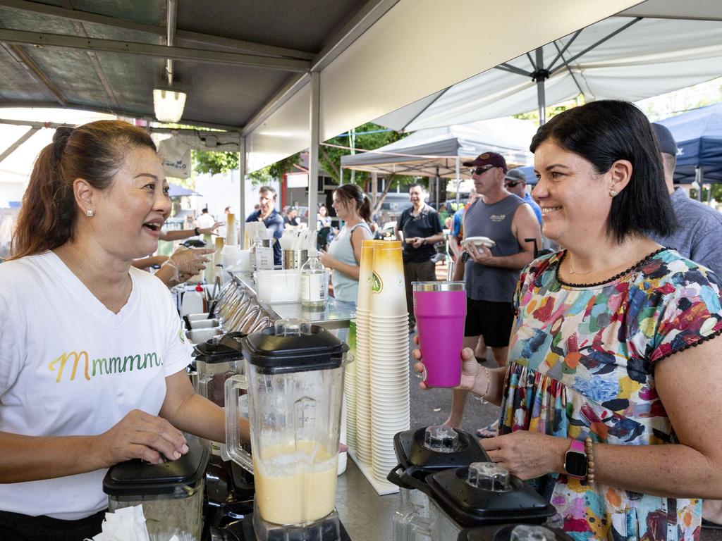 Naturally Yum employee Pum Rattarom taking Chief Minister Natasha Fyles regular lime juice order at the Nightcliff markets on Sunday. Picture Floss Adams.