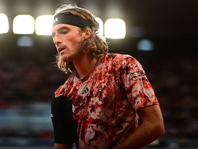 Greece's Stefanos Tsitsipas prepares to serve to Spain's Carlos Alcaraz Garfia during their men's singles quarter final match on day ten of the Roland-Garros Open tennis tournament at the Court Philippe-Chatrier in Paris on June 6, 2023. (Photo by Emmanuel DUNAND / AFP)