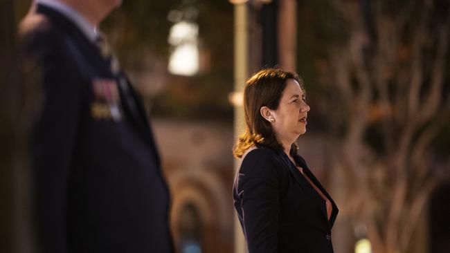 QLD Premier Annastacia Palaszczuk sings the Australian anthem during the Anzac Day Wreath Laying Ceremony at The Shrine of Remembrance in Brisbane, Saturday, April 25, 2019. Anzac Day is a national day of remembrance to commemorate the service and sacrifice of Australian and New Zealand service men and women. Due to COVID-19 restrictions marches and commemorative services have been banned for the first time in more than a century. (AAP Image/Jono Searle) NO ARCHIVING