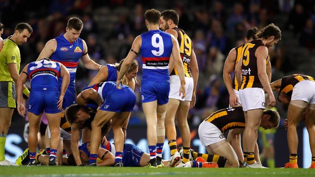 Ben McEvoy and Josh Dunkley after their heavy collision. Pic: Getty Images