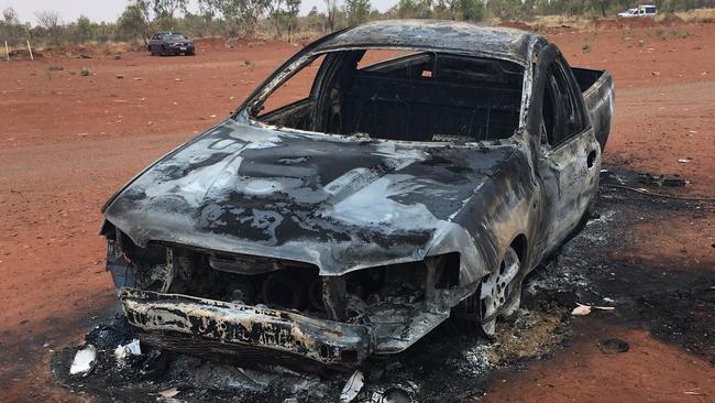 One of several vehicles set alight during the rioting. Picture: PFES Media