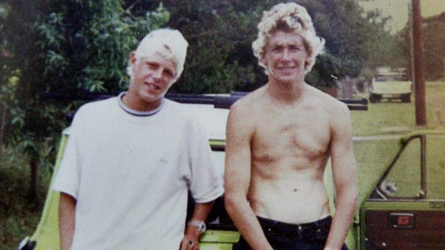 Fanning with his brother Sean as teenagers in a picture from his book 'Surf For Your Life'.