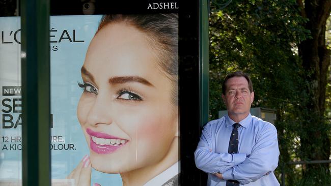 Cr Simon Menzies at an Avenue Rd bus shelter. Picture: Adam Ward