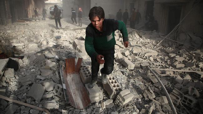 The aftermath of an airstrike by the Syrian regime against a rebel-held enclave in Easter Ghouta, near Damascus. Picture: AFP