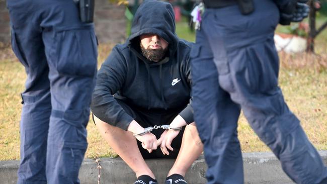 Samimjan Azari during his arrest. Picture: Jeremy Piper