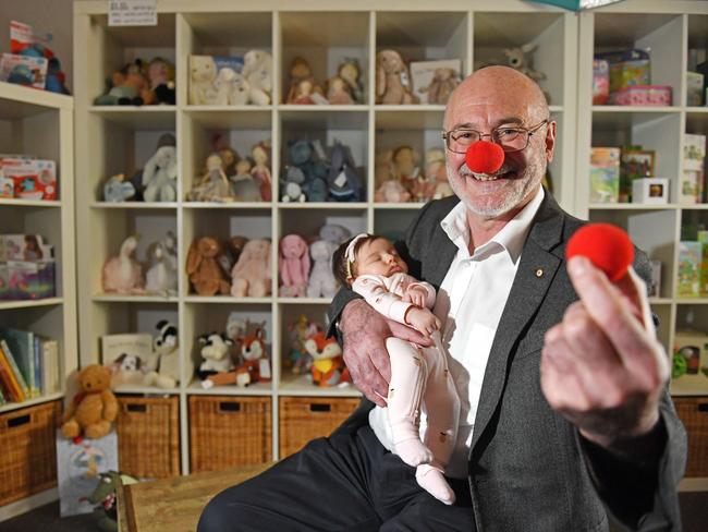 12/08/20 - University of Adelaide pathology Professor Roger Byard with Arielle, 2 months, for Red Nose day.Picture: Tom Huntley