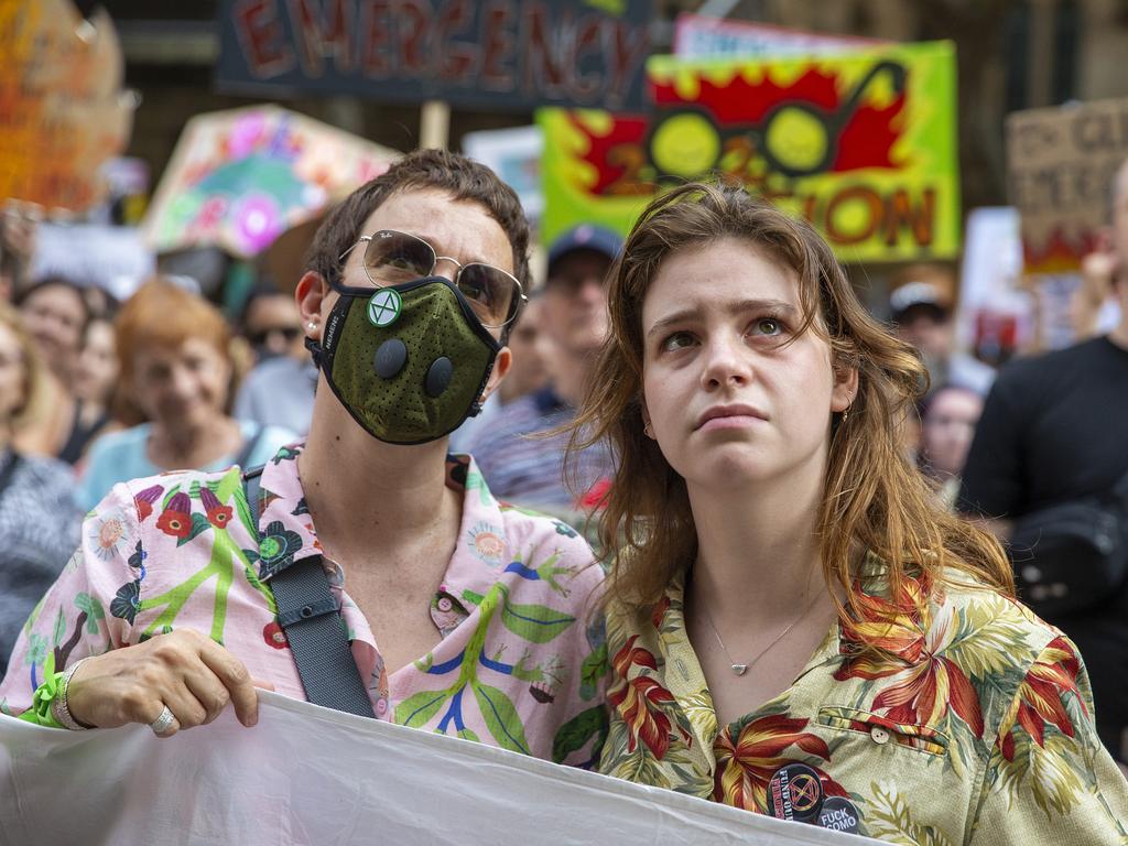 SYDNEY, AUSTRALIA - JANUARY 10: Activists rally for climate action at Sydney Town Hall on January 10, 2020 in Sydney, Australia. Protests around the country were organised in response to the ongoing bushfire crisis in Australia. Fires in New South Wales, Victoria, Queensland, Western Australia and South Australia have burned 8.4 million hectares of land. At least 25 people have been killed, including three volunteer firefighters, and thousands of homes and buildings have been destroyed. (Photo by Jenny Evans/Getty Images)