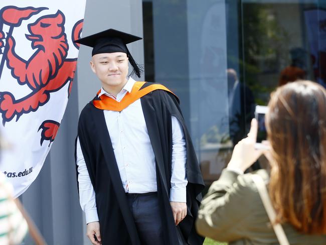 UTAS Graduations - Tasmanian School of Business and Economics and Graduate Research graduates are pictured before the ceremony. Picture: MATT THOMPSON
