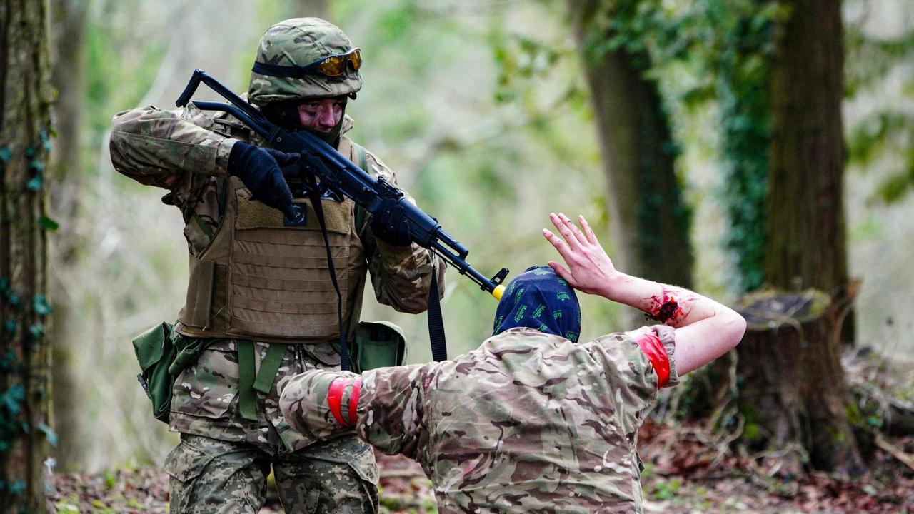 Senator Wong and Mr Marles met with the Australian soldiers training – and the Ukrainians being trained – in Wiltshire on Wednesday. Picture: Ben Birchall / POOL / AFP)