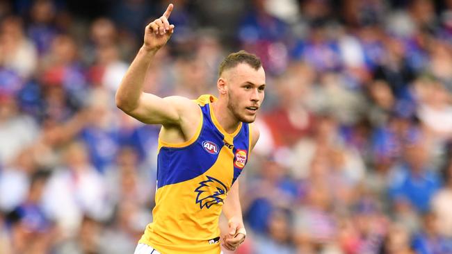 Daniel Venables kicks a goal against the Bulldogs. Picture: AAP