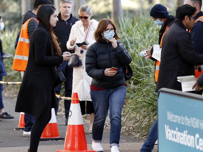 People arriving for their COVID-19 vaccination at the Sydney Olympic Park NSW Health vaccination centre. Yesterday the lines for Pfizer were around 5,000 but Astrazeneca was only about 160. People over 50 are find ways around it to get the Pfizer vaccination. Picture: Jonathan Ng