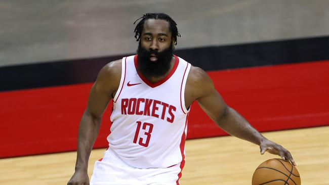 HOUSTON, TEXAS - DECEMBER 17: James Harden #13 of the Houston Rockets controls the ball during the first half of a game against the San Antonio Spurs at the Toyota Center on December 17, 2020 in Houston, Texas. NOTE TO USER: User expressly acknowledges and agrees that, by downloading and or using this photograph, User is consenting to the terms and conditions of the Getty Images License Agreement. Carmen Mandato/Getty Images/AFP == FOR NEWSPAPERS, INTERNET, TELCOS &amp; TELEVISION USE ONLY ==