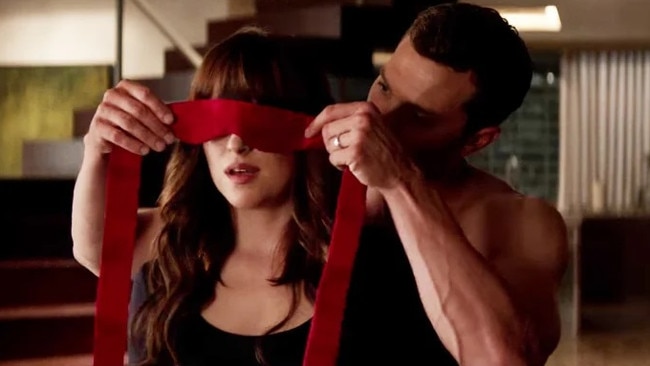 Dakota Johnson and Jamie Dornan in Fifty Shades of Grey.