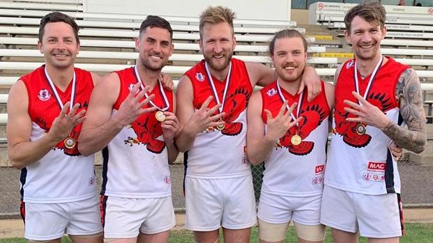 Brad Kirk (middle) after his fourth flag with Flagstaff Hill. Picture: File