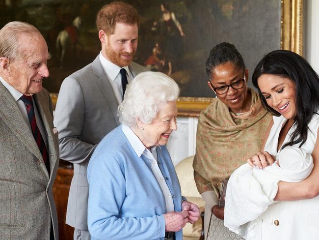 Prince Harry, second from left, introduced baby Archie to the Queen and Prince Philip, with Meghan Markle and her mother Doria Ragland at Windsor Castle. Picture: AFP 