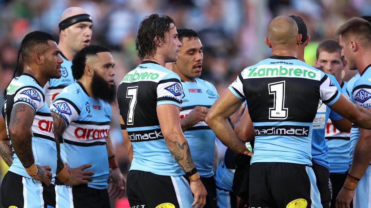 SYDNEY, AUSTRALIA - MARCH 31: Nicho Hynes of the Sharks and teammates huddle during the round four NRL match between Cronulla Sharks and Canberra Raiders at PointsBet Stadium, on March 31, 2024, in Sydney, Australia. (Photo by Cameron Spencer/Getty Images)