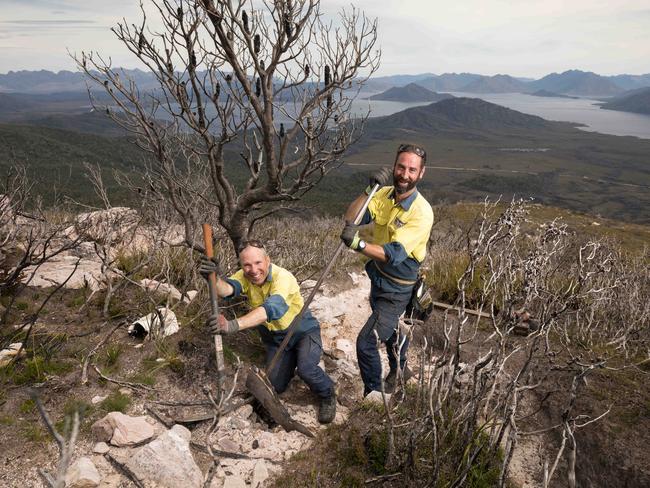 Track builders  (LtoR) Dan Roe and Cam Sweeney of Mtn.Trails, a Tasmanian specialist trail building company working on the Mount Anne Circuit track overlooking Lake Pedder in the south west of Tasmania.  The track was completely burnt out  in the 2018/2019 bushfires.3/11/2020photo - Peter Mathew