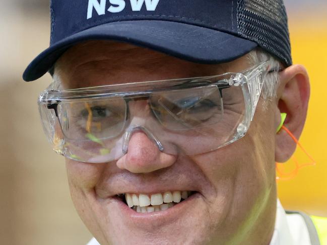 SYDNEY, AUSTRALIA - NewsWire Photos NOVEMBER 18, 2021: Prime Minister Scott Morrison pictured holding a can of Emu beer during his visit to the Tooheys Brewery in Lidcombe.Picture: NCA NewsWire / Damian Shaw