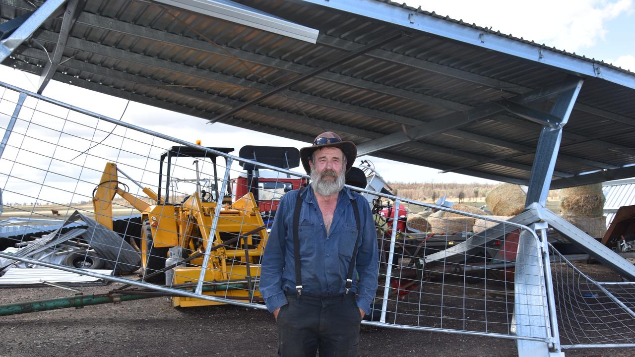 Col stands next to his destroyed shed following the Jandowae storm.