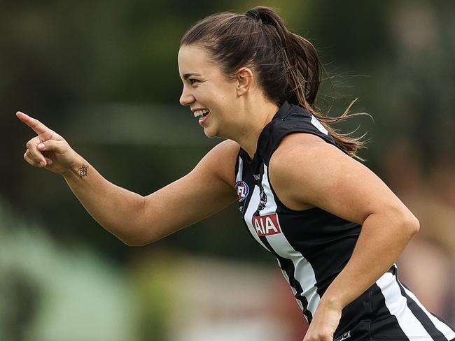 MELBOURNE, AUSTRALIA - MARCH 20: Chloe Molloy of the Magpies celebrates a goal during the round eight AFLW match between the Collingwood Magpies and the St Kilda Saints at Victoria Park on March 20, 2021 in Melbourne, Australia. (Photo by Martin Keep/AFL Photos/via Getty Images )