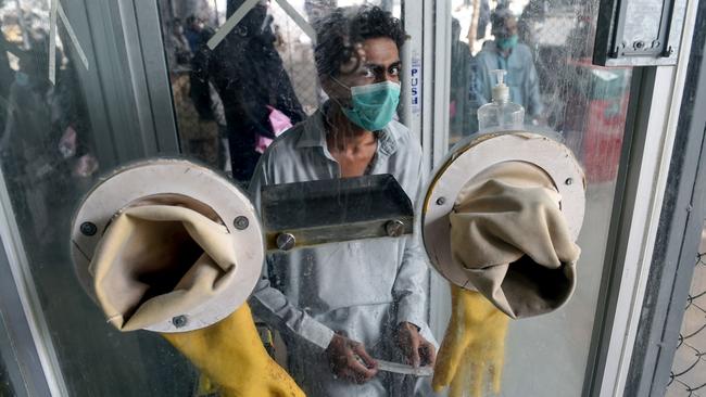 Queuing for a coronavirus test in Karachi last week. Picture: AFP