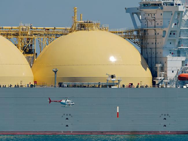 LNG tanker Pacific Breeze steams through Darwin harbour carrying a load of LNG that will be used to â€˜cool downâ€™ tanks and pipes in preparation for start-up of the facilities.