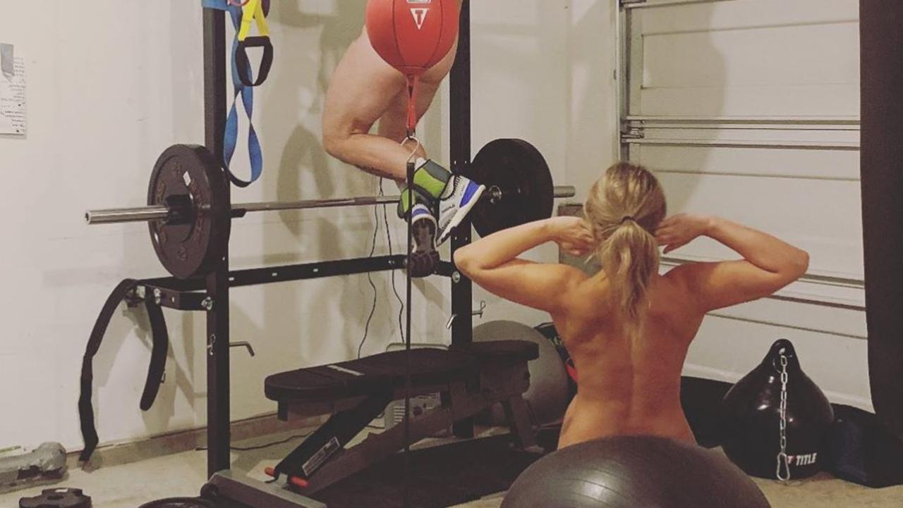 Paige VanZant and her husband workout