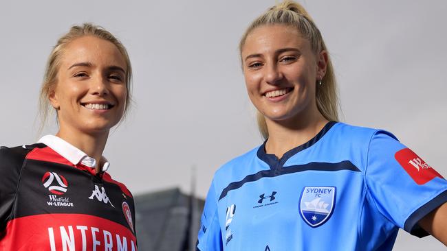 Georgia Yeoman Dale of Western Sydney Wanderers poses with Remy Siemsen of Sydney FC.