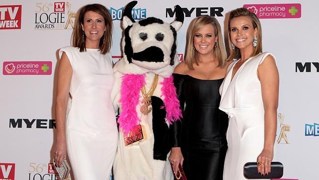 Natalie Barr, Samantha Armytage and Edwina Bartholomew arrive at the Logie Awards with ... Cash Cow. Only at the Logies, right? Picture: Getty Images