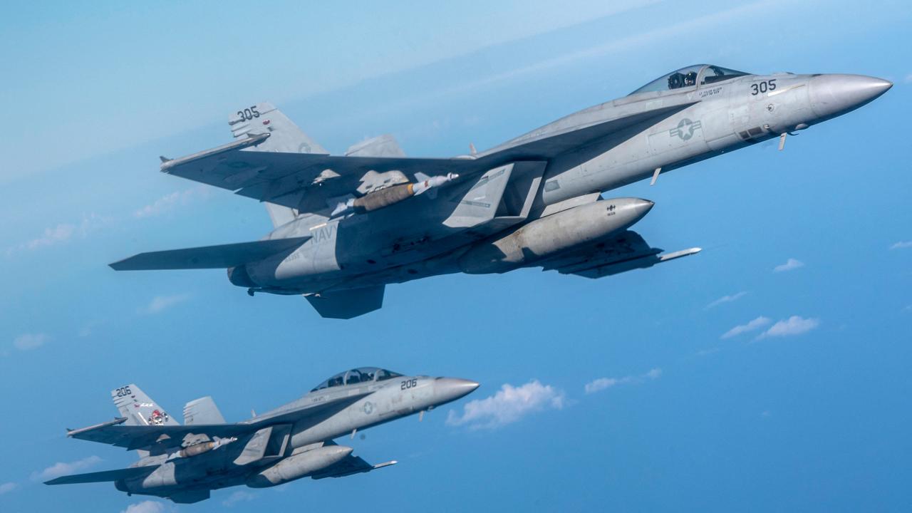 US navy F/A-18 Super Hornets fly during an exercise.