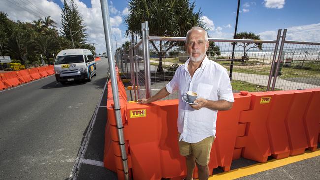 Greg Colwill owner of Elephant Rock Cafe in Currumbin was not happy with the fencing and closed carparks around his business weeks before the Games began. Picture: NIGEL HALLETT