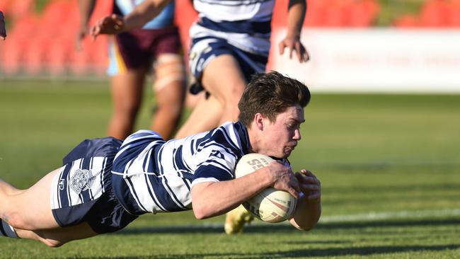 Brayden Paix goes over to try for St Marys College against Keebra Park in Langer Cup schoolboys rugby league at Toowoomba Sports Ground. Picture: Kevin Farmer