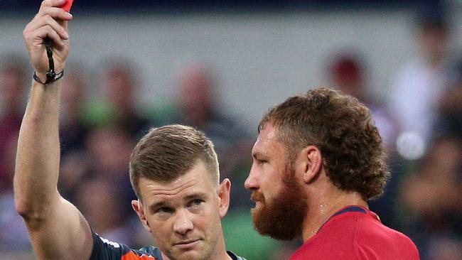 Scott Higginbotham of the Reds is shown a red card during the round 2 Super Rugby match between the Melbourne Rebels and the Queensland Reds at AAMI Park in Melbourne, Friday, February 23, 2018. (AAP Image/Hamish Blair) NO ARCHIVING, EDITORIAL USE ONLY