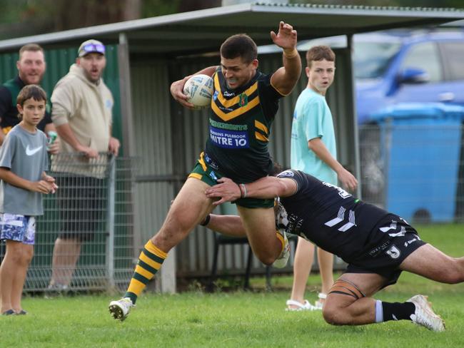 A seemingly try-bound Jordan Tencate is tackled over the sideline by Picton’s Henry Lealuga-Puhotau. Picture: Warren Gannon Photography