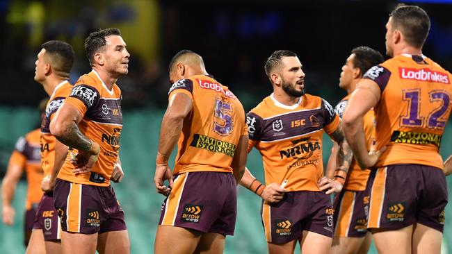 Shattered Broncos contemplate their embarrassing loss to the Roosters. (AAP Image/Dean Lewins)