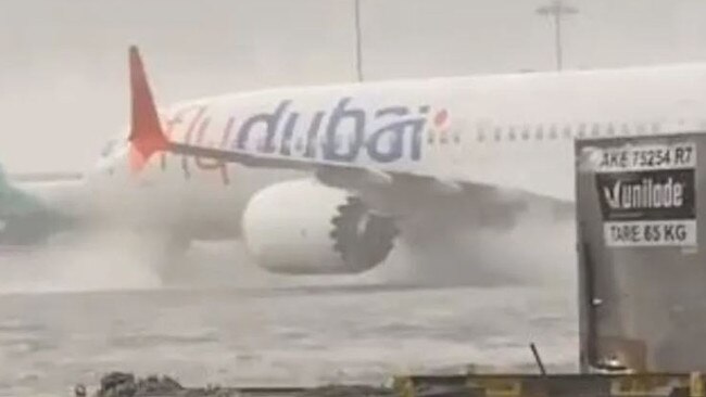 A plane takes off from the flooded Dubai International Airport. Picture: Supplied