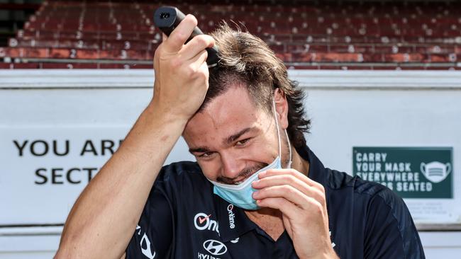 Carlton forward Jack Silvagni takes the clippers to his hair at Ikon Park   on Friday, October 8 as a show of support for teammate Sam Docherty.