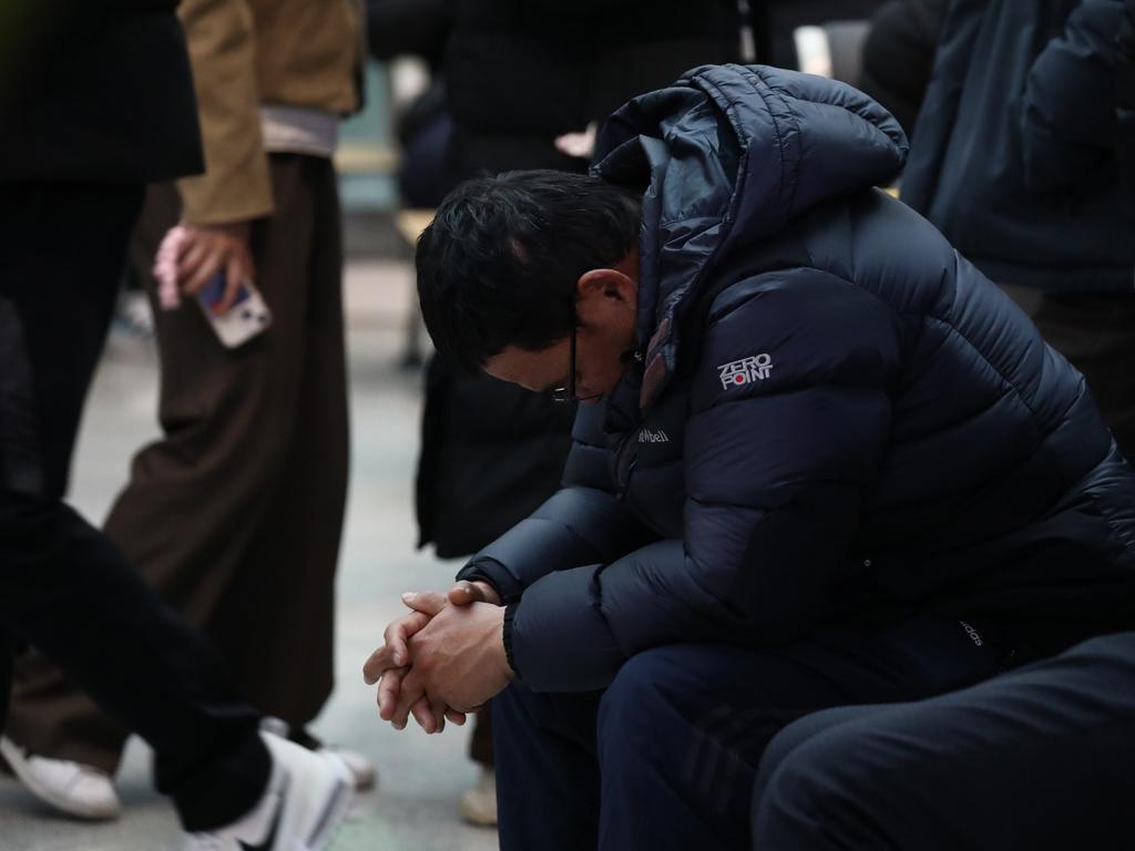 A relative of a passenger of the aircraft reacts at the Muan International Airport on December 29, 2024 in Muan-gun, South Korea. Picture: Chung Sung-Jun/Getty Images