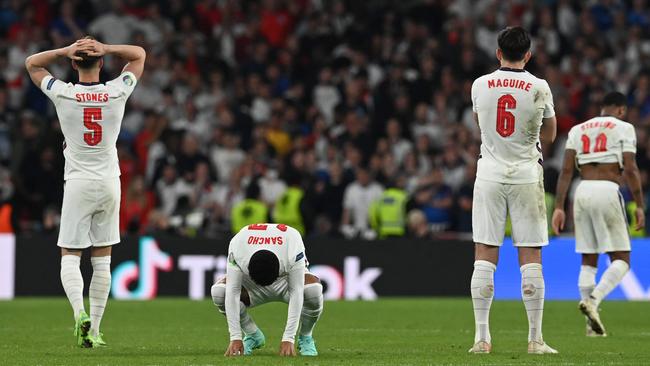 England's players diget their loss at Wembley Stadium in London.