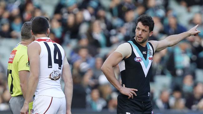 Travis Boak wins the toss at Adelaide Oval. Picture: SARAH REED